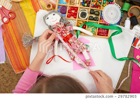 girl sews doll clothes top view sewing accessories girl sews doll clothes top view sewing accessories 29782903