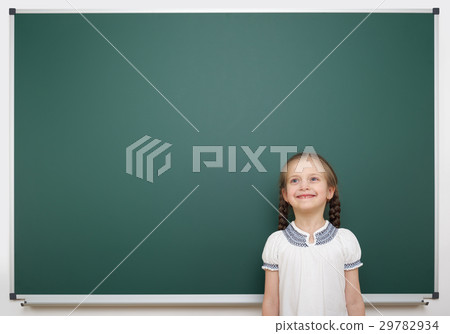 school student girl posing at clean blackboard 29782934