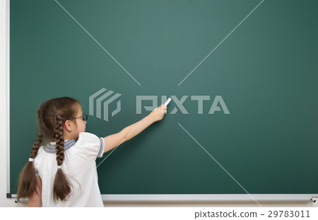 school student girl posing at clean blackboard school student girl posing at clean blackboard 29783011
