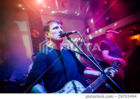 Band performs on stage 29783494