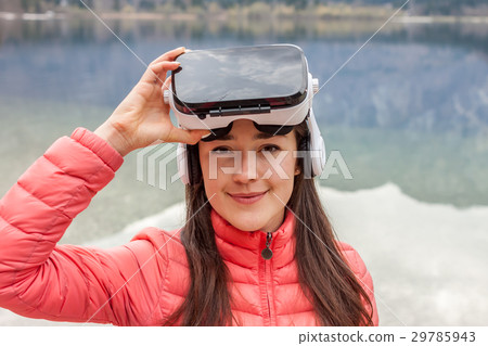 young woman in VR glasses 29785943