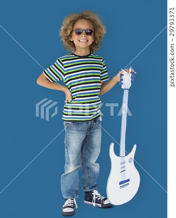 Portrait of a Little African Descent Boy with a Guitar Isolated Portrait of a Little African Descent Boy with a Guitar Isolated 29791371