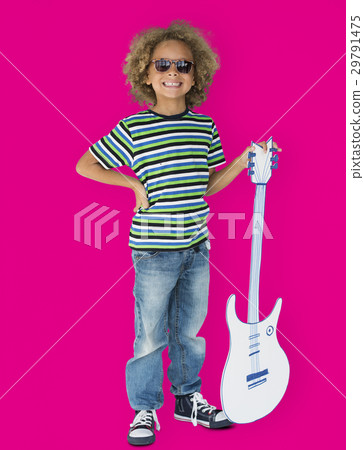 Portrait of a Little African Descent Boy with a Guitar Isolated Portrait of a Little African Descent Boy with a Guitar Isolated 29791475