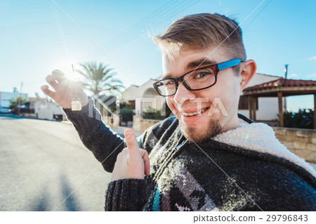 Happy new home owner with key Happy new home owner with key 29796843