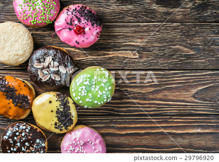 Glazed donuts with different fillings Glazed donuts with different fillings 29796920