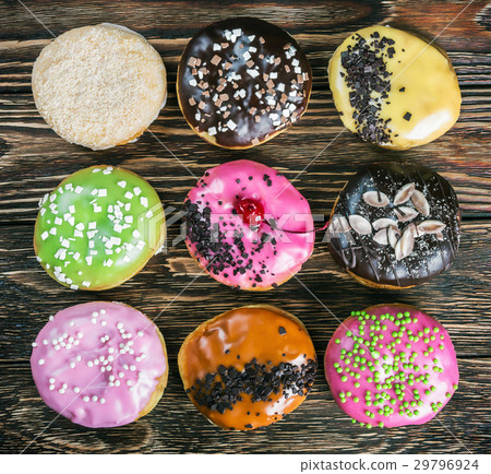 Glazed donuts with different fillings Glazed donuts with different fillings 29796924