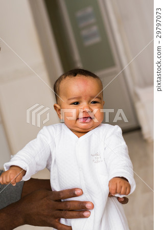 Little mix race asian african baby close up at 29797073