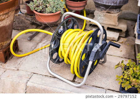 Yellow Garden hose. 29797152