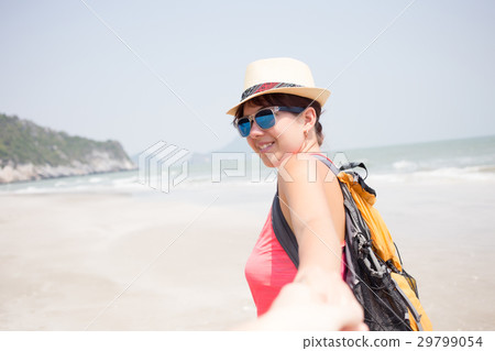 Young woman on sandy beach Young woman on sandy beach 29799054