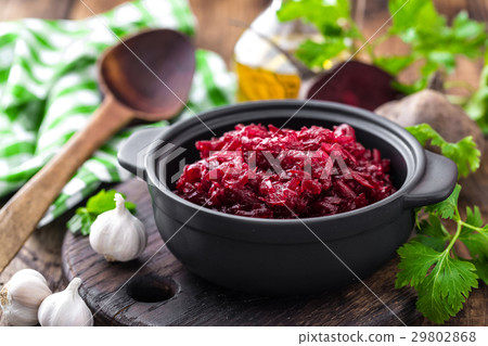 Beetroot salad on wooden background closeup Beetroot salad on wooden background closeup 29802868