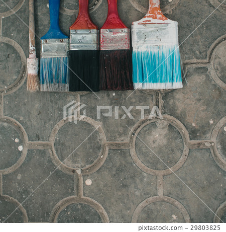 Paint brushes on the old tile background Paint brushes on the old tile background 29803825