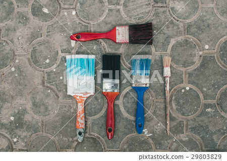 Paint brushes on the old tile background Paint brushes on the old tile background 29803829