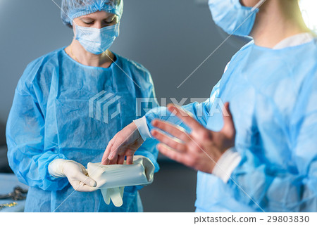 Surgeon getting ready for operation 29803830