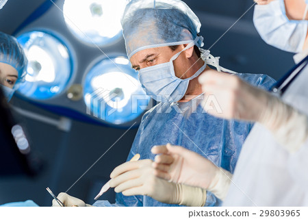 Worried surgeon at operating room Worried surgeon at operating room 29803965