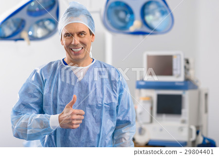 Merry doctor in operating theatre 29804401