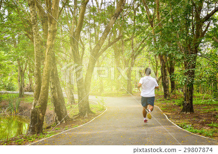man is running in the park, healthy lifestyle 29807874