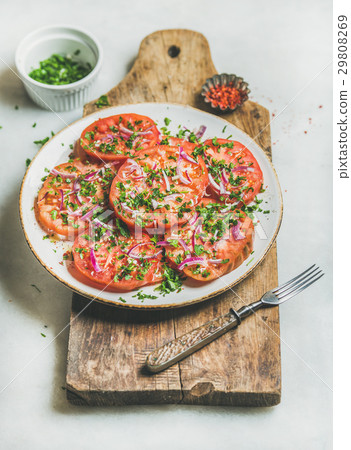 Fresh heirloom tomato, parsley and onion salad Fresh heirloom tomato, parsley and onion salad 29808269
