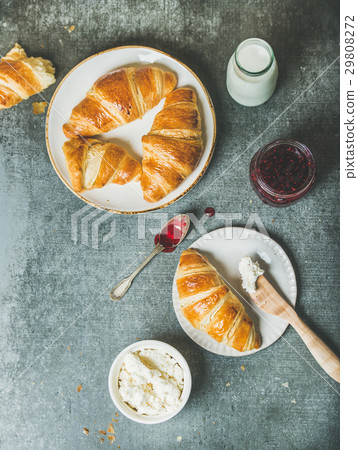 Freshly baked croissants with jam, cream-cheese 29808272