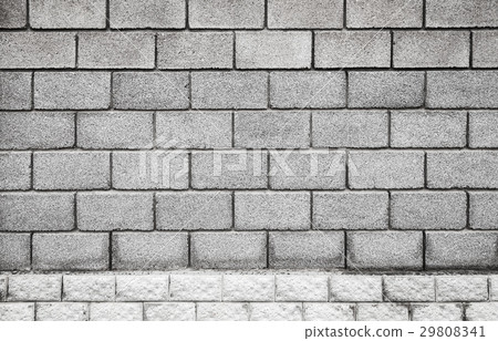 Stone wall made of gray foam concrete blocks 29808341