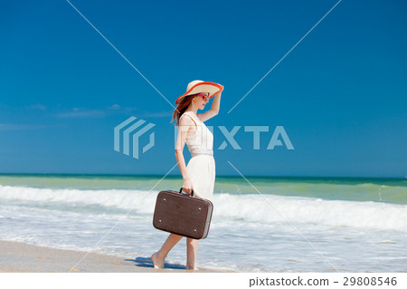 photo of beautiful young woman on beach 29808546
