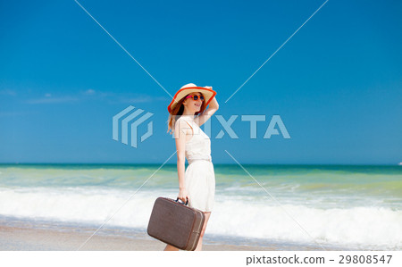 photo of beautiful young woman on beach 29808547