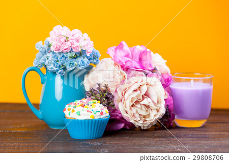 tasty glazed donut near wonderful flowers 29808706