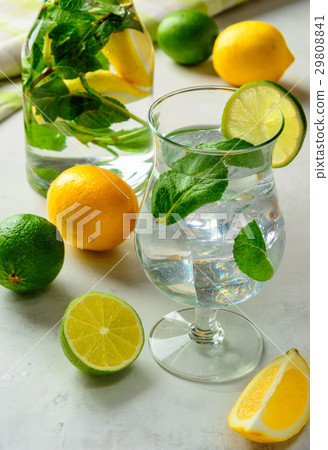 lemonade in a glass on a white background. 29808841