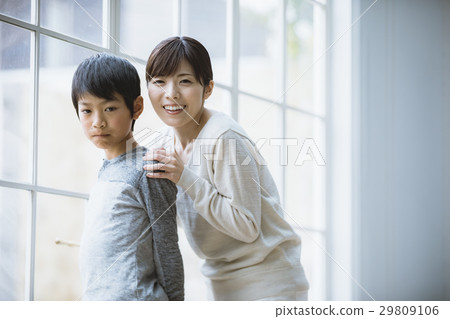 Mothers looking out the window 29809106