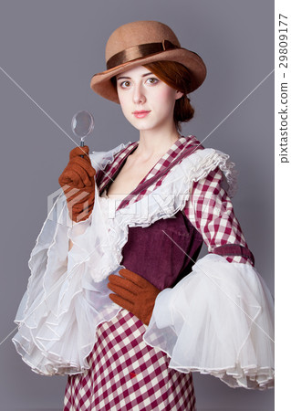 photo of beautiful young woman in vintage dress  29809177