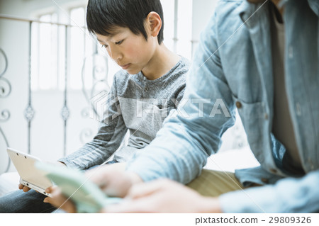 Parents playing with mobile games Parents playing with mobile games 29809326