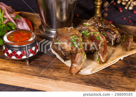 Mutton uvulas, are served with French fries and on Mutton uvulas, are served with French fries and on 29809585