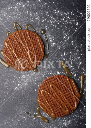 Stroopwafels with caramel sauce 29809891