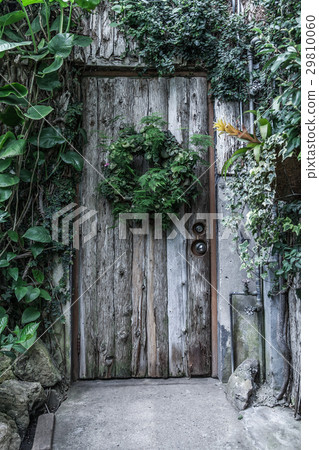 Wooden door in an old cottage Wooden door in an old cottage 29810060