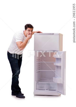 Man looking for food in empty fridge Man looking for food in empty fridge 29811955
