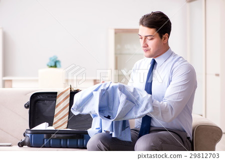 Businessman preparing for the business trip 29812703