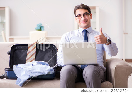 Businessman preparing for the business trip 29812704