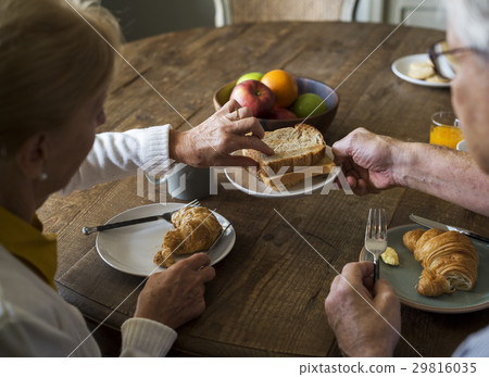 Senior Adult Couple Eat Breakfast 29816035