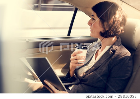 Businesswoman Using Tablet Car Inside 29816055