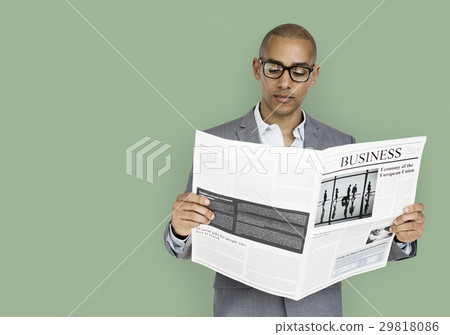 African Descent Business Man Reading Newspaper African Descent Business Man Reading Newspaper 29818086