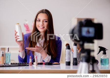 Beauty fashion blogger recording video for blog 29820850