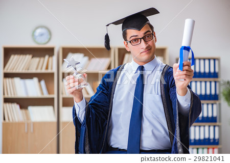 Young man graduating from university Young man graduating from university 29821041