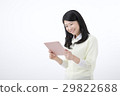 A young woman with a tablet PC 29822688