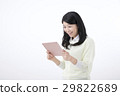 A young woman with a tablet PC 29822689