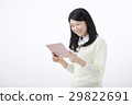 A young woman with a tablet PC 29822691