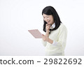 A young woman with a tablet PC 29822692