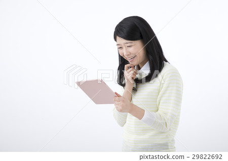 A young woman with a tablet PC A young woman with a tablet PC 29822692