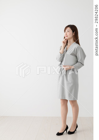 Woman holding a laptop computer, business 29824206