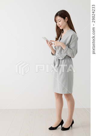 Women using mobile phones, business Women using mobile phones, business 29824233