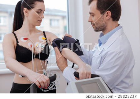 Concentrated brilliant medical worker preparing Concentrated brilliant medical worker preparing 29825237
