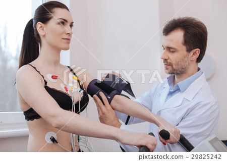 Competent modern doctor using special tools for Competent modern doctor using special tools for 29825242